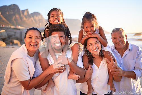 Image of Summer, love and big family in South Africa at the beach enjoy the sun, freedom and happy holidays together. Smile, grandparents and mother with father carrying young children at sea in a portrait