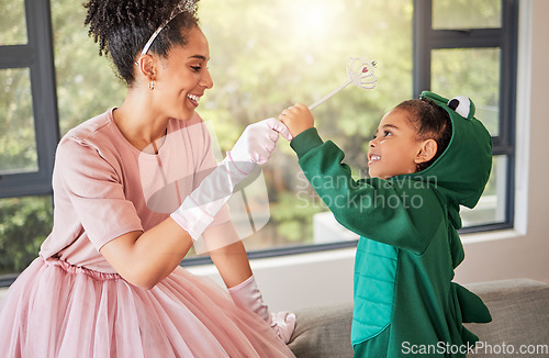 Image of Child halloween party, mother as princess and girl in dinosaur suit for for creative kid development in home together with lens flare. Happy mom with kid birthday in a fantasy or fairy character