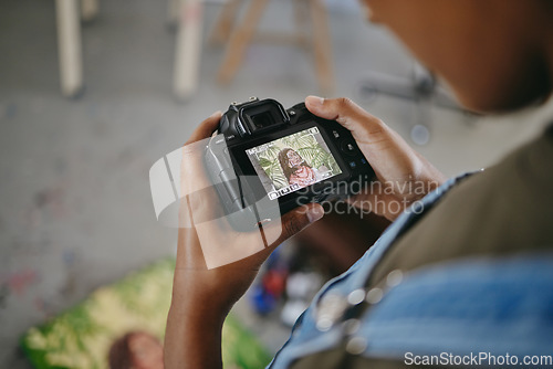 Image of Hands, art painting and digital camera photograph for creative e commerce store, online shopping website and ecommerce sales. Zoom on indian woman, painter and designer photography of workshop canvas