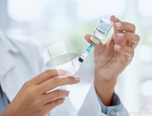 Image of Covid, medicine and vaccine with hands of doctor holding syringe and glass vial for healthcare, pharmacy and science. Innovation, medical and research with pharmacist working on treatment for virus