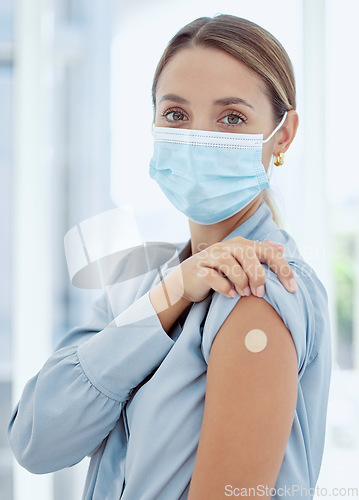 Image of Woman with plaster on arm from covid vaccine and mask, medical injection and corona virus for immune system, wellness and clinic healthcare. Female patient with flu vaccination, treatment and risk