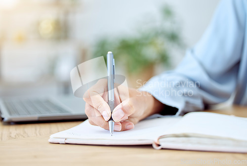 Image of Woman hands, writing notebook and planning ideas at receptionist desk in startup. Closeup writer, journalist and secretary of schedule, agenda planner and strategy reminder, budget notes and analysis