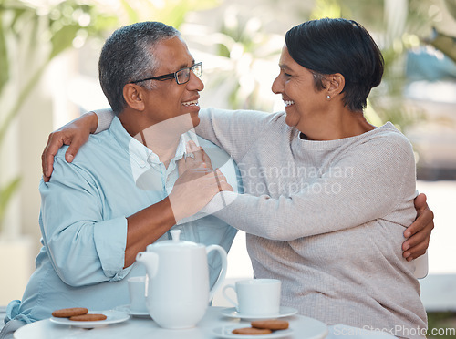 Image of Senior couple laughing, drinking coffee and bonding in backyard cafe together, relax and cheerful outdoors. Elderly man and woman enjoying retirement and their relationship, sharing a joke and snack