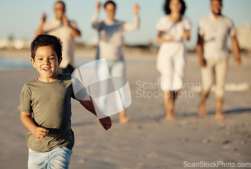 Image of Boy, running and beach with family, happy and cheerful while walking in the sand. Young male child by ocean, run on shore in summer, parents and grandparents have joyful time together in background