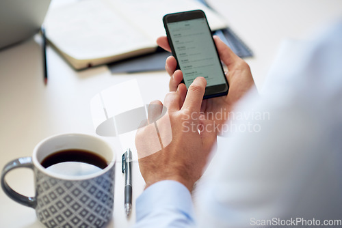 Image of Businessman hands working on phone screen with coffee in a office online on a mobile. Digital, internet and web app of a business man planning a web email or strategy for a project on a worker desk