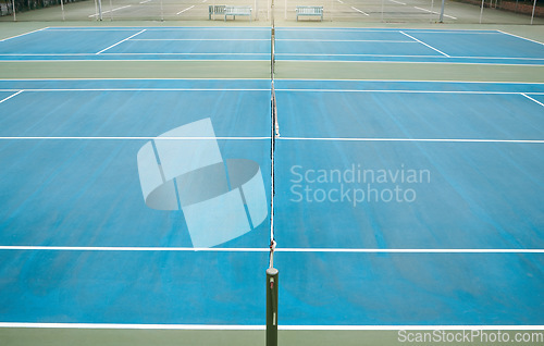 Image of Empty tennis, court and sports space ready for exercise, training and game workout with mockup. Fitness, cardio and isolated sport match area for to play with a light at night and mock up area