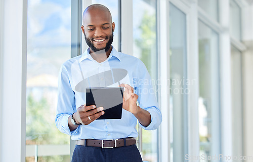 Image of Happy businessman with digital tablet check the online stock market or money trading. Corporate Black man or worker smile at fiance profit and growth of investment on the internet in a startup office