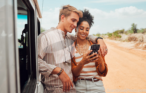 Image of Car, phone and couple on a road trip in summer on holiday to enjoy traveling and sharing social media news. Nature, interracial and happy woman searching on gps map with calm partner on a vacation