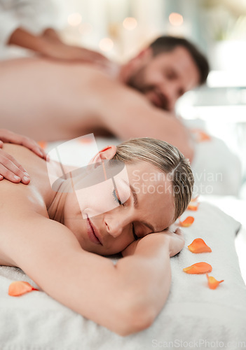 Image of Wellness, beauty and couple massage at spa for health and relax in zen resort, peaceful and happy. Salon, luxury and man and woman enjoy treatment by massage therapist on their vacation in Thailand