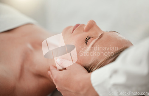 Image of Spa, woman head massage and calm skincare treatment of a woman feeling relax and peace. Wellness, beauty and luxury facial for body relaxation and cosmetic dermatology using botox at a salon