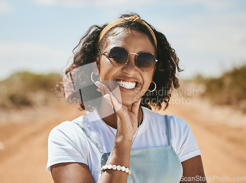 Image of Happy, smile and black woman on a travel road trip break in the summer sunshine in nature. Portrait of a person from Texas face with happiness and vacation fun outdoor in the sun feeling freedom