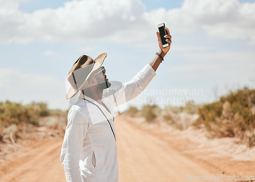 Image of Travel influencer, man or phone live streaming for social media review of National Park in South Africa for content creator vlog. Vlogger, blogger or tourist on 5g mobile technology and lost network
