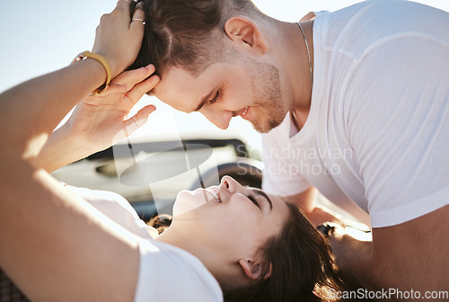 Image of Love, couple and look at each other being happy, smile and romantic bonding together, celebrate relationship and talking. Romance, man and woman enjoy loving moment, passionate and being playful.