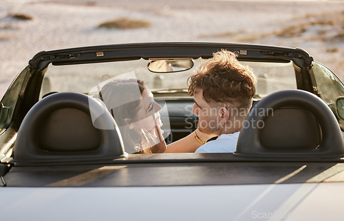 Image of Car, travel and couple together on a road trip stop by a beach to spend quality time. Holiday transport break of a girlfriend and boyfriend smile with love, happiness and vacation gratitude outdoor