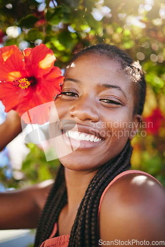 Image of Summer flower, sunshine and black woman facial beauty care. Happiness, inner beauty and natural happy glow or smile on relaxing, wellness and self care vacation near Hibiscus plant tree