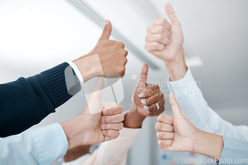 Image of Hands, thumbs up and business people hand agreement closeup in support of trust, thank you and a job well done. Success, teamwork and trust with corporate team of colleagues showing yes in office