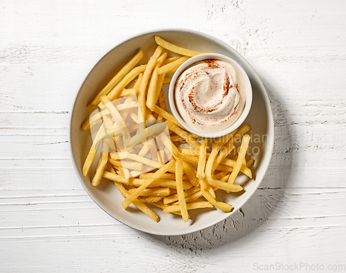 Image of french fries with mayonnaise dip