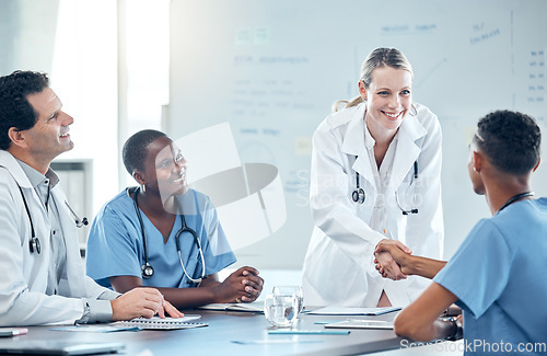 Image of Handshake, doctors meeting or diversity team happy for partnership, hospital onboarding or promotion of nurse employee. Medical interview success, thank you and welcome from hiring healthcare manager