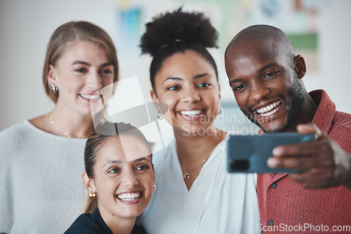 Image of Diversity, friends and phone selfie with a smile together in a hole with friendship love. Happy, mobile and people using technology in a house showing friendship unity, group happiness and solidarity