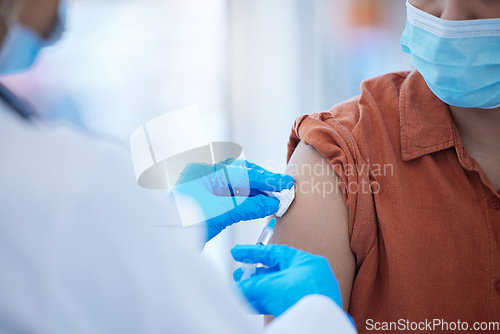 Image of Doctor hands, vaccine or covid injection in arm for global virus security, safety or wellness insurance. Zoom, woman or healthcare medical employee or covid 19 compliance hospital worker and medicine