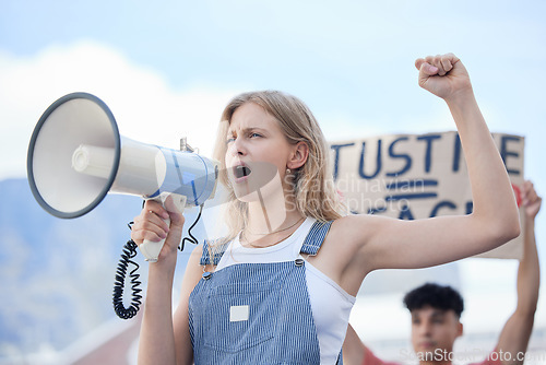 Image of Justice, megaphone and woman protest for justice, community solidarity and human rights voice on racism, government and women equality. Activism crowd or people with cardboard sign and freedom speech