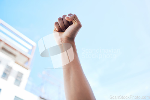 Image of Fist hands, in air for protest rally and justice with solidarity with Iran woman movement for freedom, human rights or empowerment. People fight climate change, call for action and corrupt politics.