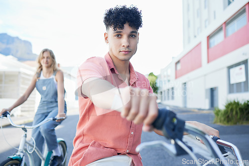 Image of Bike, travel and friends with a man and woman riding a bicycle together in the city during summer. Sport, cycling and carbon footprint with a young male and female friend biking in an urban town