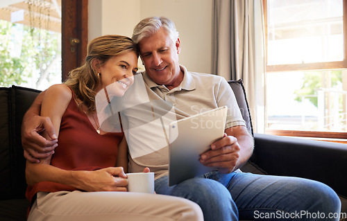 Image of Tablet, relax and old couple streaming a movie via online subscription or enjoying internet video content on sofa. Smile, love and married woman watching tv with a romantic elderly partner at home