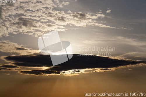 Image of beautiful cloudy sky during sunset