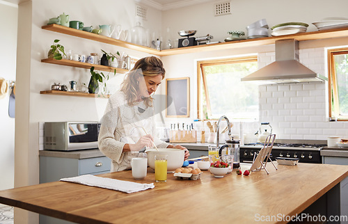 Image of Cooking, tablet and senior woman with recipe for food on the internet while in the kitchen of her house. Happy elderly chef with digital information for breakfast, lunch or dinner in her house