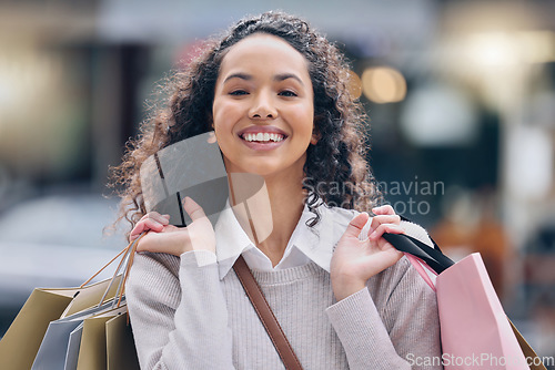 Image of Shopping, black woman and smile after a shop, fashion retail or luxury store trip with happiness. Portrait of a happy rich young female from Paris or urban city smiling with joy for sale or discount