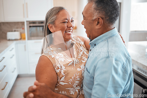 Image of Senior couple dance in kitchen with celebration for retirement, real estate or happy marriage. Elderly pension people dancing to music with love, care and wellness in their house or home together