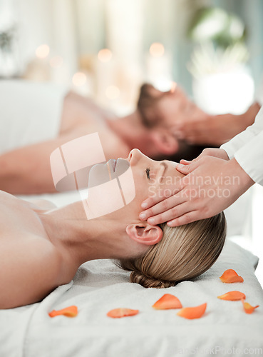 Image of Couple, head massage or relax wellness in hotel, hospitality salon or zen spa in stress release, relax or self care. Reiki hands, man or woman on table bed for peace, headache relief or healthy sleep