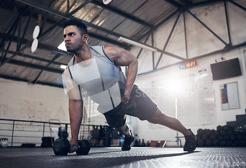 Image of Man fitness dumbbell training, health workout and lifestyle or sport wellness motivation. Focused health athlete, fit active lifestyle and muscle build strength technique with gym exercise equipment