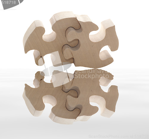 Image of wooden puzzle with reflection