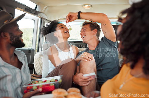 Image of Road trip, fruit and healthy couple eating in van for countryside lifestyle, travel or holiday camping journey. Relax friends or people with farm food, lunch or grapes and games in a caravan together