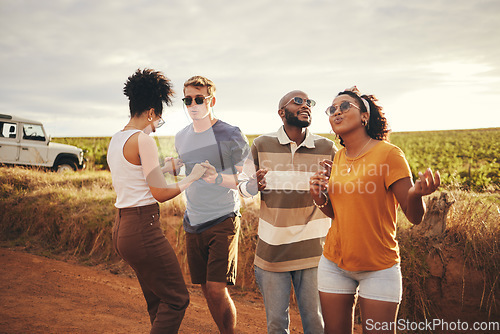Image of Diversity, friends and dance outdoor on holiday, vacation and relax together on dirt road trip in countryside. Group, students happy and travelling in summer for getaway or fun weekend away as couple