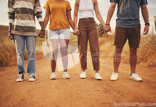 Image of Support, teamwork and friends holding hands in summer for road trip vacation for community, collaboration and mission together. Networking, growth and goals with group of people on holiday safari