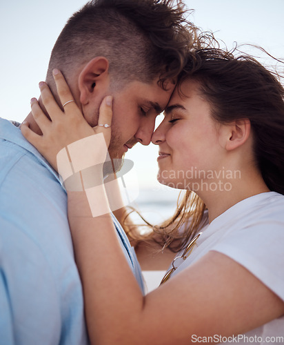 Image of Couple, love and happy together on adventure and bonding in romantic holiday during summer. Real young man and woman hugging, peace and intimacy, strong relationship and spending quality time.