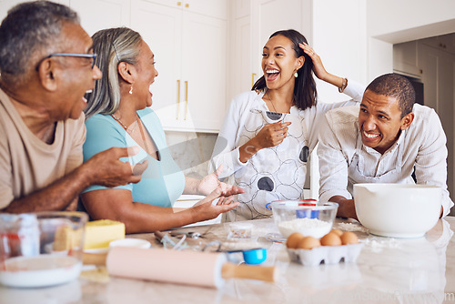 Image of Black family, kitchen and happy for cooking, baking and bonding in home. Family, comic and conversation for happiness, love and time together on holiday, vacation or break to relax, talking and fun