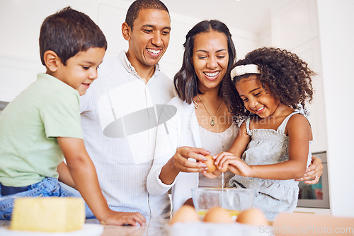 Image of Mother, father and children learning baking as a happy family together teaching siblings to bake cakes. Mom, dad and kids cracking eggs, cooking and parents helping boy and girl in child development