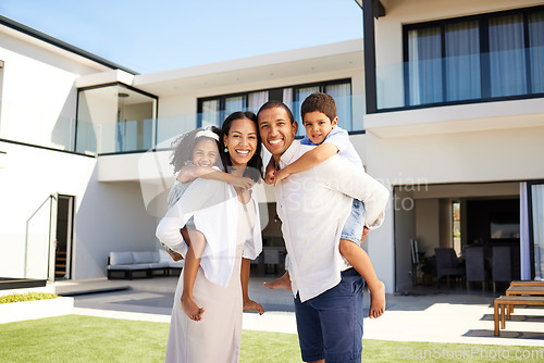 Image of Family, happy and new home in summer at property, mortgage and mansion backyard. Parents, children and smile for piggyback on grass at luxury, real estate or house together for happiness in Atlanta