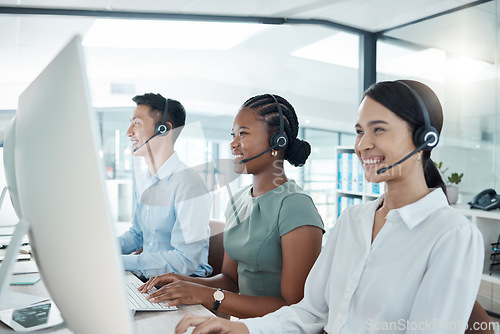 Image of Call center, telemarketing or customer support consultants working on computer in a modern office. Diversity, crm and happy employees consulting for ecommerce, sales and customer service with tech.