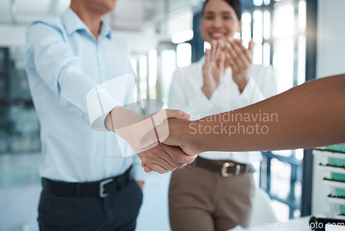 Image of Management shaking hands with applause of meeting, consulting and hiring agreement of deal, partnership or office onboarding. Business people welcome handshake, hr promotion opportunity and b2b sales