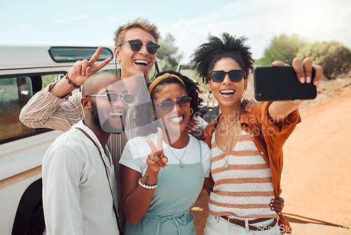 Image of Diversity, selfie and friends on road trip adventure in a countryside taking a picture on phone. Travel, holiday and group of people with smartphone, car and smile on faces, happy on nature vacation