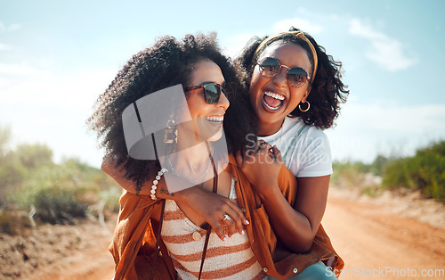 Image of Black women, friends and nature holiday portrait, vacation or summer trip. Safari, sunglasses and girls piggy back, spending time together bonding and having fun in countryside, outdoors or desert.