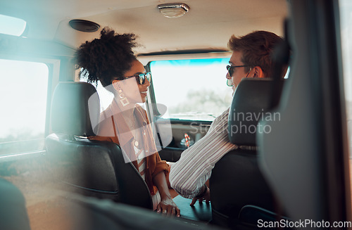 Image of Happy, smile and couple in conversation while on road trip vacation with car in summer. Happiness, freedom and interracial man and woman on travel holiday, outdoor adventure or journey in countryside