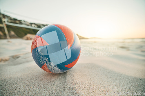 Image of Beach sand, ball and volleyball games at tropical ocean, sunshine nature and sea landscape in Miami, Florida. Closeup empty shore, summer team sports training and action fitness for energy outdoors