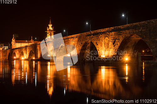 Image of Bridge crossing the Rio Lima at night
