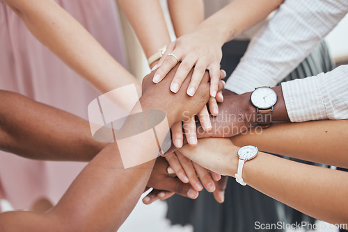 Image of Collaboration, diversity and support hands of people come together for teamwork, goal motivation and community. Partnership, solidarity and business employee cooperation for startup company success